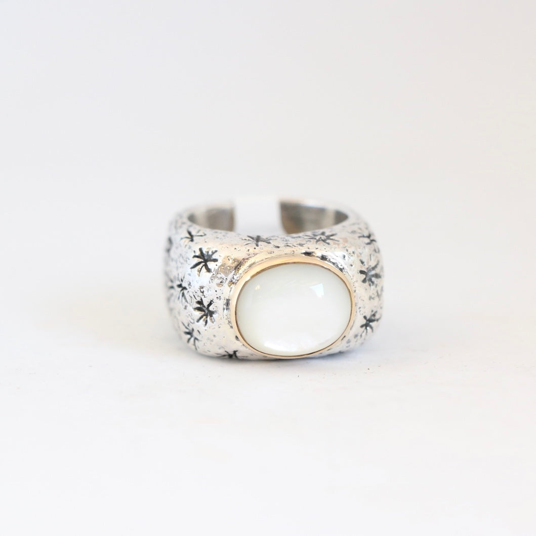 Oval Mother of Pearl with Gold Bezel and Starburst Shank Ring Rings Dian Malouf   